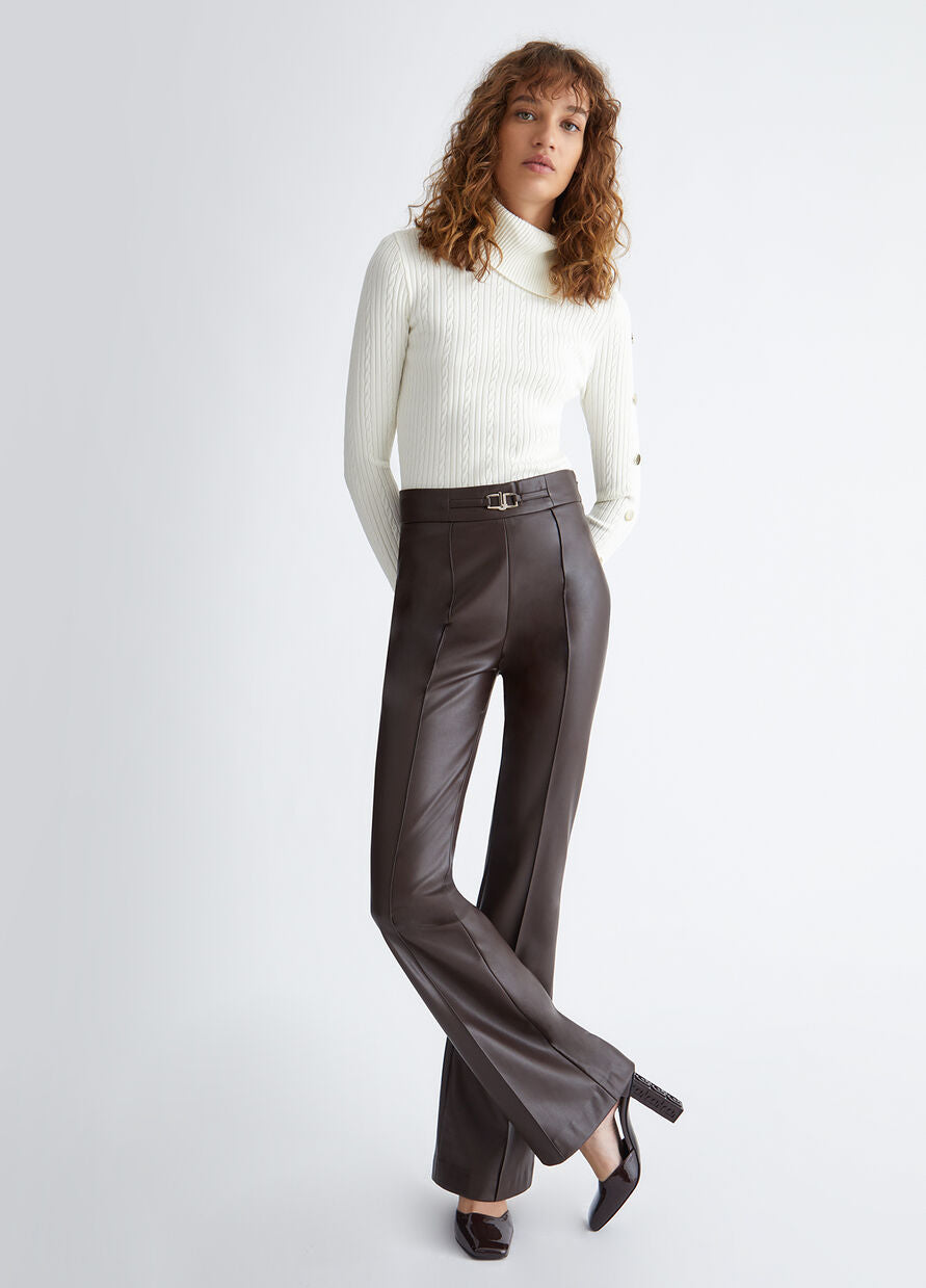 LUI JO TURTLENECK WITH BUTTON SLEEVE DETAIL