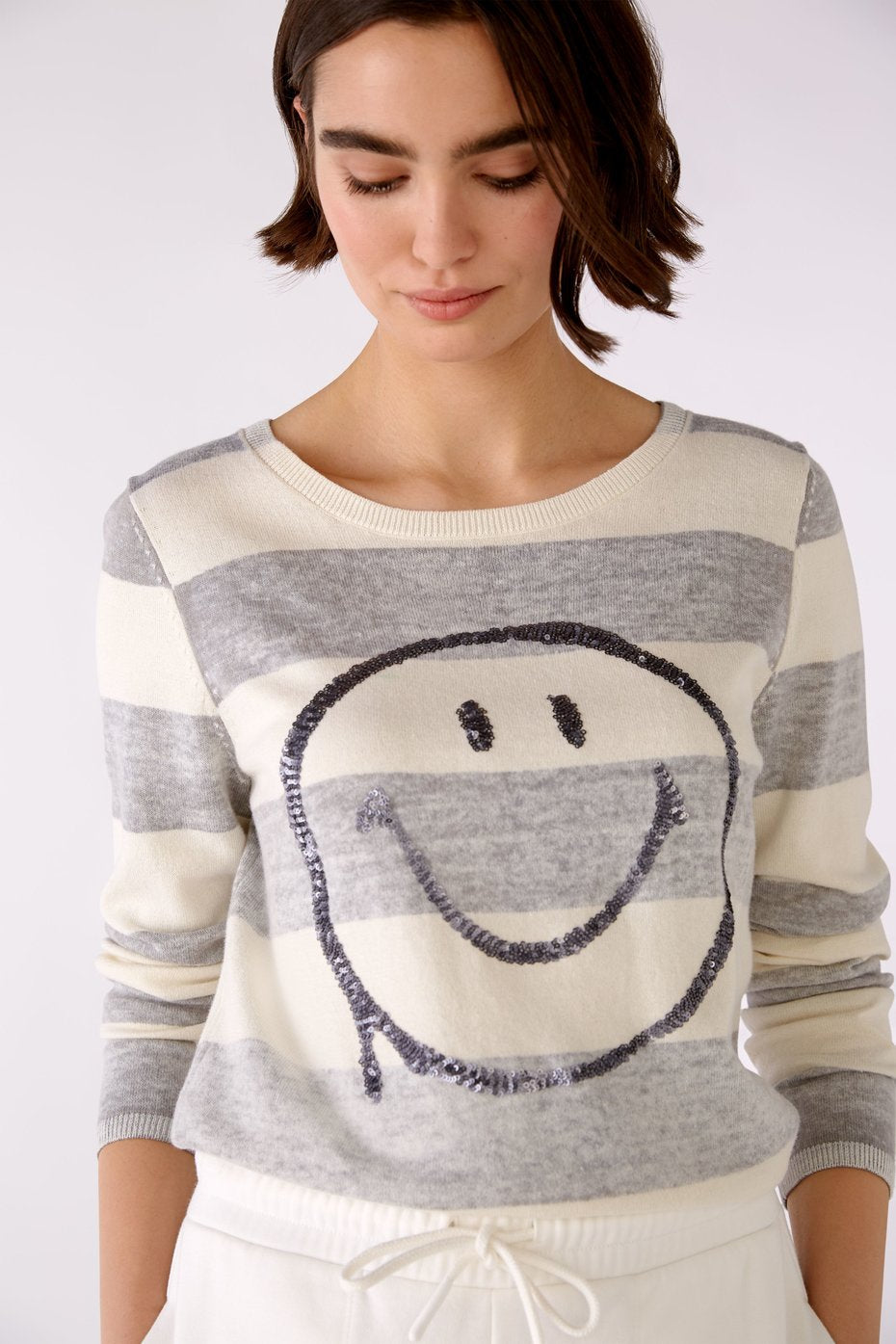 OUI CLOTHING SMILEY FACE SWEATER WITH SEQUINS