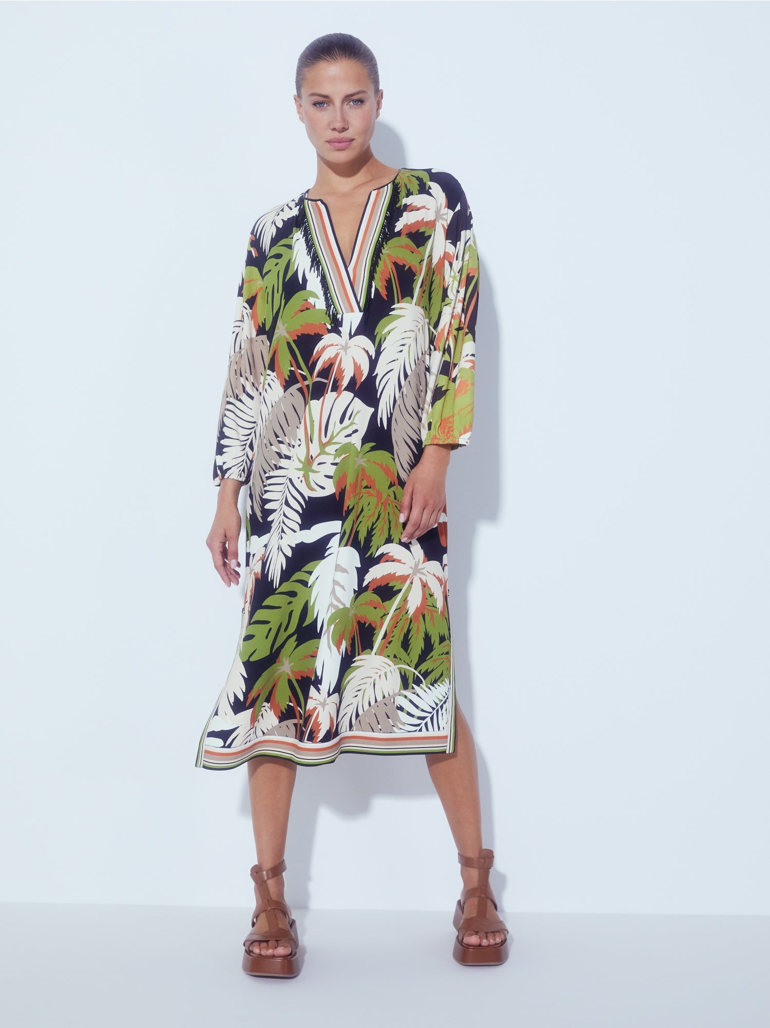 MARC CAIN LOOSE DRESS WITH A TROPICAL FLORAL MOTIF